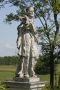 An old historic statue of St. Nepomuk between the green lanscape near Staatz, Weinviertel, Lower Austria