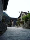 Old historic traditional schist stone rock buildings houses in Sonogno village Verzasca Valley Ticino Switzerland Royalty Free Stock Photo