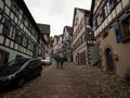 Old historic typical traditional half-timbered house building in cobblestone streets of Schiltach Black Forest Germany Royalty Free Stock Photo