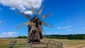 Old historic wooden windmill in a field Royalty Free Stock Photo