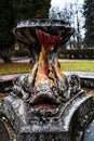 Old, historical, abandoned non - working fountain with fish sculptures, Baldone, Latvia