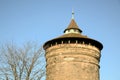 Old historical brick blocks tower with clear blue sky in winter Royalty Free Stock Photo