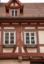 Old historical building and half-timber house with red wood Royalty Free Stock Photo