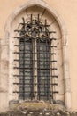 Old historical building with a lattice made of steel in front of the window Royalty Free Stock Photo