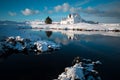 Old historical building at Reykjanes peninsula in Iceland. Beautiful sunset water reflection. Most popular place in golden circle.