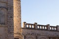 Old historical buildings. Stone ancient walls with blue sky background. Tourism concept