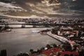 Dramatic view of Old historical estuary bridge in Istanbul, lights of the city, old houses, highway and park Royalty Free Stock Photo