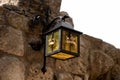 Historical lantern on the castle wall Royalty Free Stock Photo