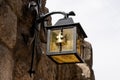 Historical lantern on the castle wall Royalty Free Stock Photo