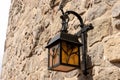 Historical lantern on the castle wall Royalty Free Stock Photo