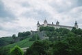 old historical marienberg fortress and green trees on hill Royalty Free Stock Photo