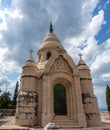 Old historical mauseleum in the cemetary of town of supetar, croatia. Large stone grave dedicated to petrinovic family Royalty Free Stock Photo