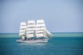 Old historical tall ship with white sails in blue sea russia Royalty Free Stock Photo