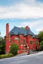 Old historical Victorian house with red brick walls in Montreal, Quebec, Canada