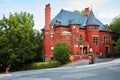 Old historical Victorian house with red brick walls in Montreal, Quebec, Canada