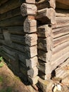 Old historical weathered wooden log house corner Royalty Free Stock Photo