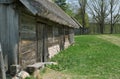 Old historical wooden house standing at the forest