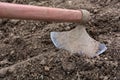 Nostalgic Agricultural Work: A Retro Hoe Cultivating a Field