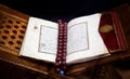 Old Holy Islamic book Koran opened in leather binding with brown Royalty Free Stock Photo