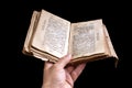 Old holy quran in hand Royalty Free Stock Photo