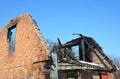 Old Home Burns Down. Brick House Roof Fire Damage. Royalty Free Stock Photo