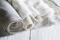 Old homespun and modern factory linen fabrics in rolls Royalty Free Stock Photo