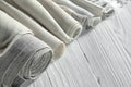 Old homespun and modern factory linen fabrics in rolls Royalty Free Stock Photo