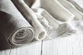 Old homespun and modern factory linen fabrics in rolls Royalty Free Stock Photo