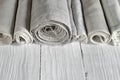 Old homespun and modern factory linen fabrics in rolls Royalty Free Stock Photo