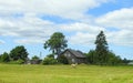 Old homestead in field, Lithuania