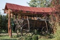 An old horse cart decorated with onion ropes Royalty Free Stock Photo