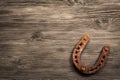 Distressed wood with a rusty horseshoe Royalty Free Stock Photo