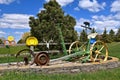 Horse pulled hay mower used a yard decoration Royalty Free Stock Photo