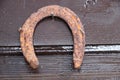 an old horseshoe hanging on a nail, luckily