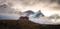 Old hotel above Zermatt. Peak of mount Adlerhorn covered by glacier. Royalty Free Stock Photo