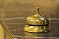 Old hotel bell on a marble stand Royalty Free Stock Photo