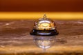 Old hotel bell on a marble stand Royalty Free Stock Photo