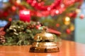 Old hotel bell on a wood stand Royalty Free Stock Photo
