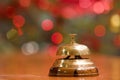 Old hotel bell on a wood stand Royalty Free Stock Photo
