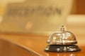 Old hotel bell on a wood stand Royalty Free Stock Photo