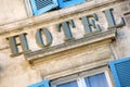 Old hotel sign South of France, provence rustic style, traditional window shutters Royalty Free Stock Photo