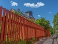 Old hous with red fence in Stockholm. Sodermalm district. Sweden.