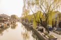 Old house along the river in the morning