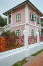 An old stye pink house white and red wall beautiful old archicture