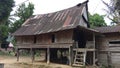 Old house architecture that has carved motifs on the foundation of the house