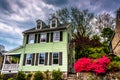 Old house and azalea bushes in Ellicott City, Maryland. Royalty Free Stock Photo