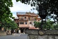 old house with balconies and lamp