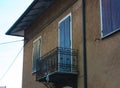 An old house with brown walls. dark blue wooden doors Royalty Free Stock Photo