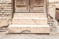 Old house damaged staircase or stairs with broken concrete tiled steps