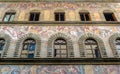 Old house, decorated with frescoes on the street in Florence Royalty Free Stock Photo